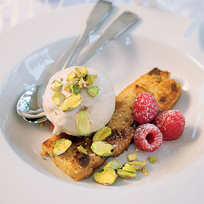 Zabaglione ice cream with raspberries, pistachios and crispy panettone