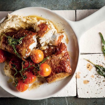 Parma ham-wrapped fish with vine tomatoes