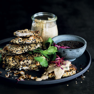 Coconut-and sesame-crumbed chicken with satay sauce