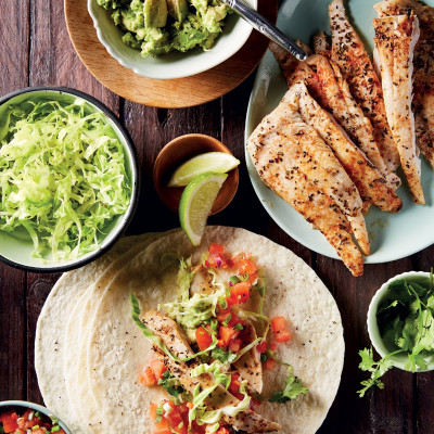 Fish tacos with smashed avocado and tomato salsa