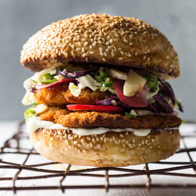 Pork schnitzel and pineapple slaw burger