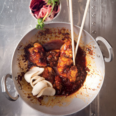 Korean sticky stir-fried chicken with beetroot onion pickle