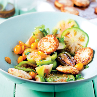 Exotic tomato salad with ricotta fritters and tomato-seed dressing