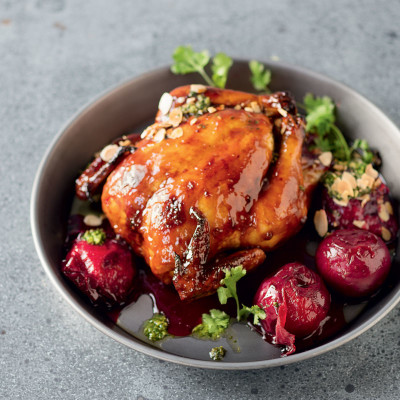 Sticky plum chicken with coriander and almonds