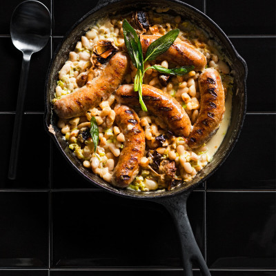 Sausage baked in creamy beans