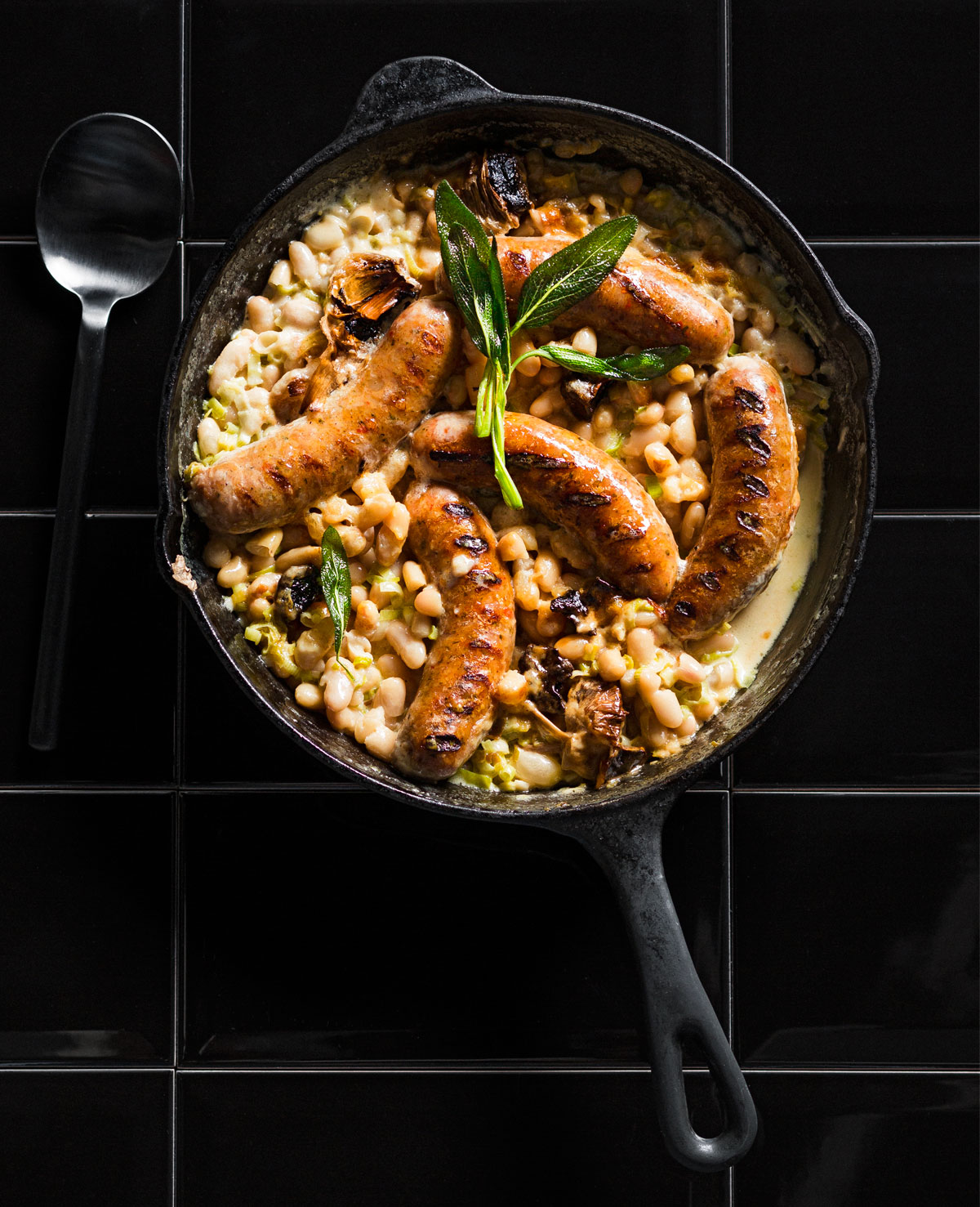 Italian sausage baked in creamy beans