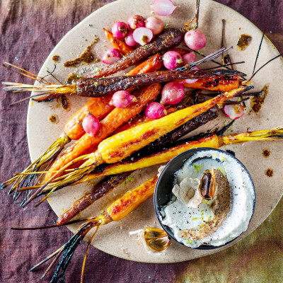 Roast black garlic with poached carrots and honey radishes