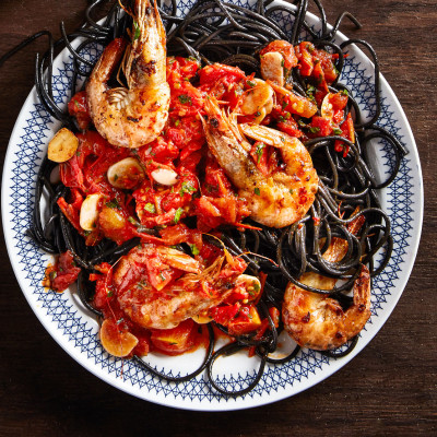 Squid ink pasta and prawns all'amatriciana