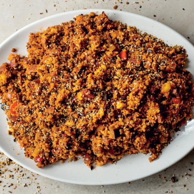 Warm lentil salad with couscous and vegetables