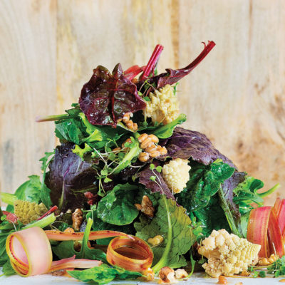 Organic baby leaf salad with pickled romanesco, spelt and roasted walnuts