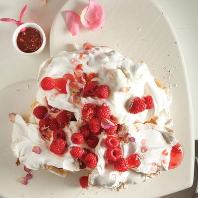 Rose pavlova with raspberries