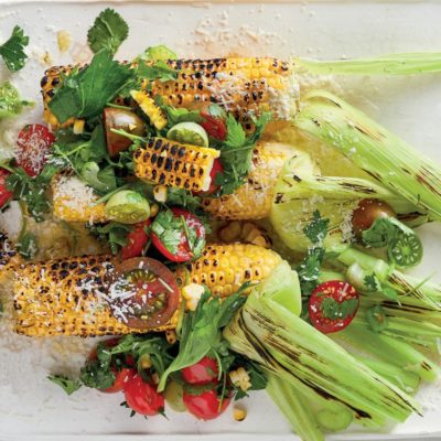 Charred corn on the cob with tomato salsa