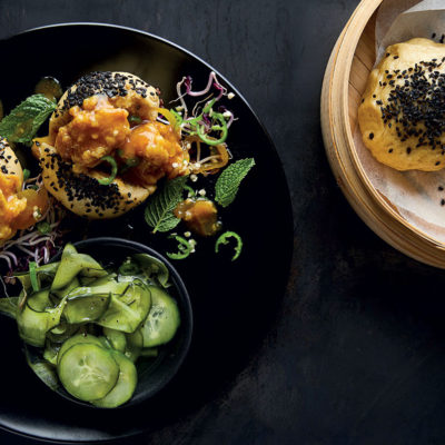 Home-made steamed buns with pickled cucumber and pickled fish