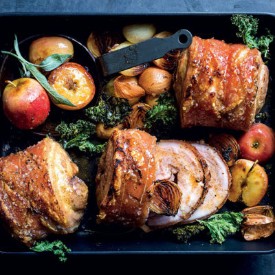 Roast pork belly with cider, apple and sage