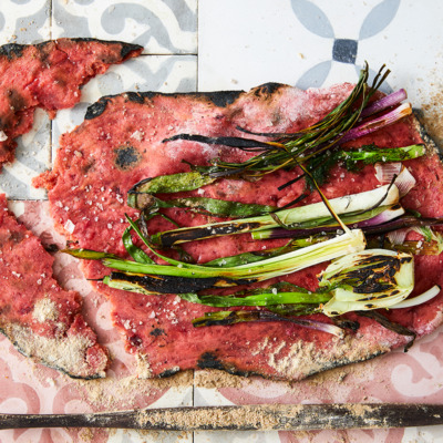 Beetroot flatbread with charred greens