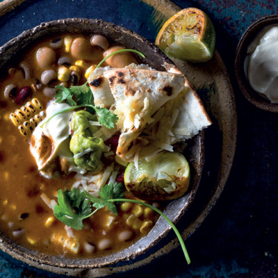 Black bean and coriander soup with zesty guacamole