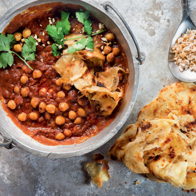 Butter chicken-style chickpea curry with busted rotis