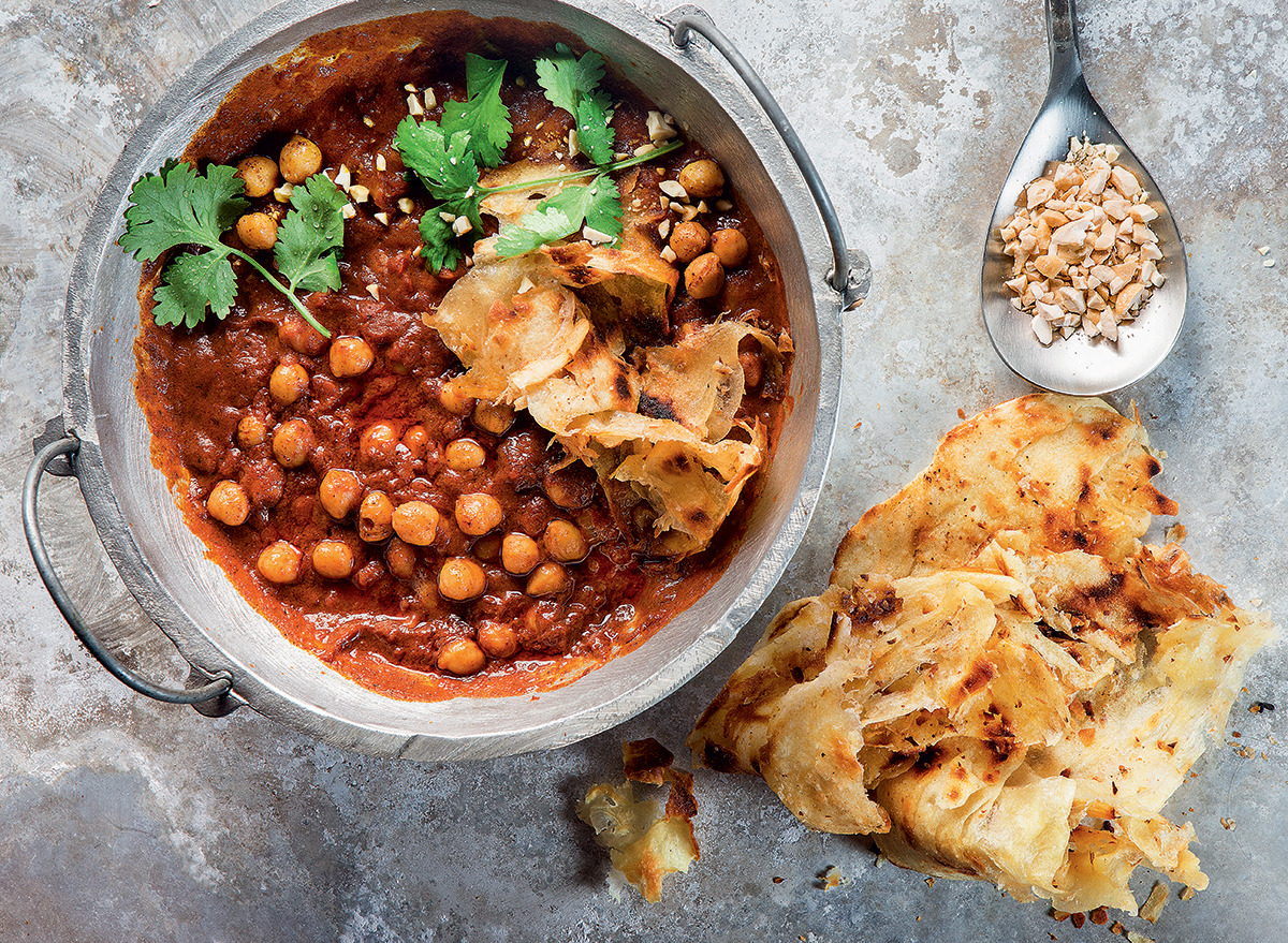 Butter chicken-flavoured chickpea curry with home-made busted rotis recipe