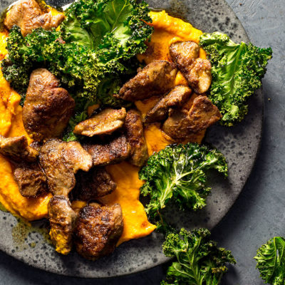 Chicken livers with carrot mash and crispy kale