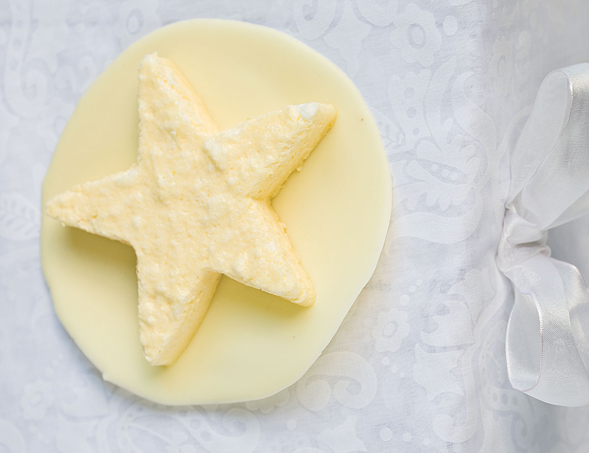 Honeycomb blancmange stars served on a decadent white-chocolate plate 