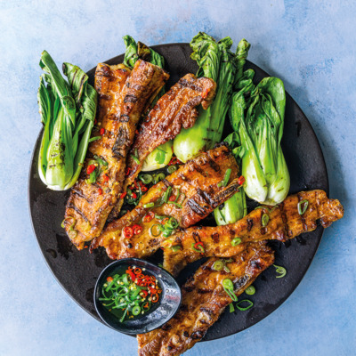 Grilled pork rashers and pak choi with soya, chilli and spring onion