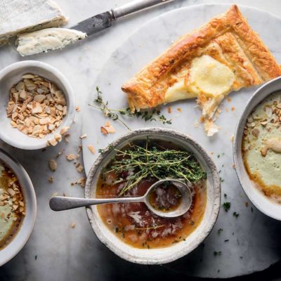 Cauliflower, leek and almond brown-butter soup with potato puffs