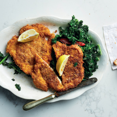 Grana Padano-and-coppa crumbed chicken with sautéed kale