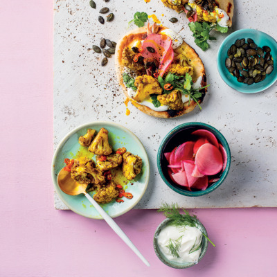 Turmeric-and-chilli cauli floret pitas with cabbage slaw