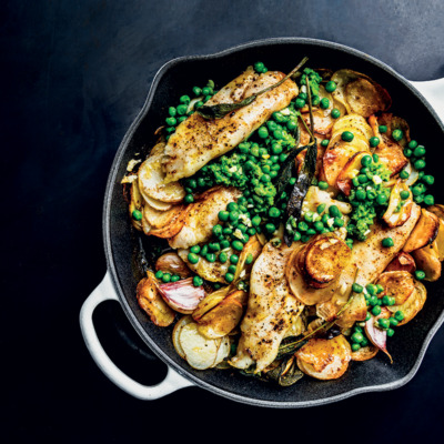 Potato-crusted baked hake with smashed peas