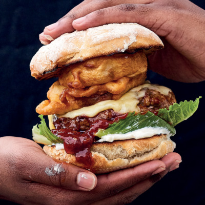 Hand-cut rump burgers with onion rings and monkeygland sauce