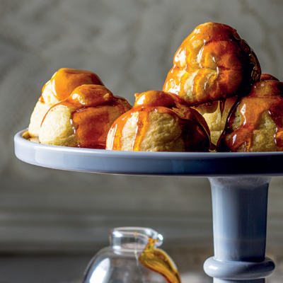 Sweet profiteroles with créme pâtissière and caramel