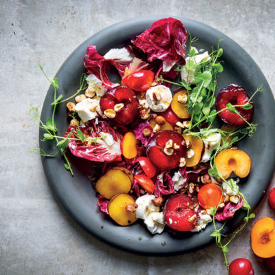 Plum, goat's cheese and hazelnut salad