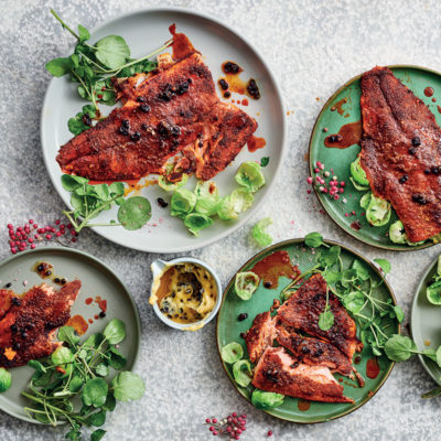 Blackened trout with currant butter and lemony Brussels sprouts