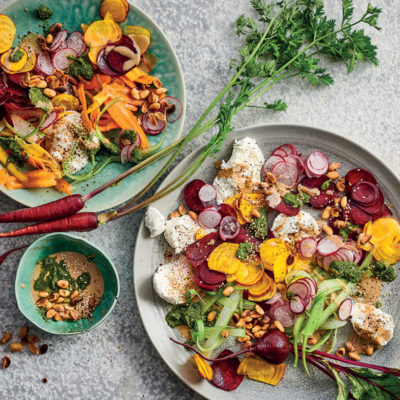 Shaved baby root veggie salad with tahini dressing and carrot top pesto