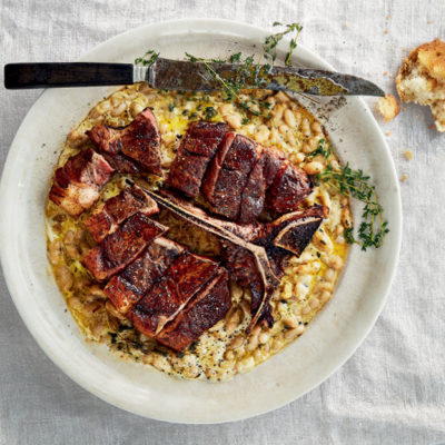 Bistecca fiorentina with creamy beans