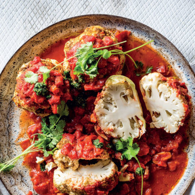 Cumin-spiced cauliflower with roast tomatoes