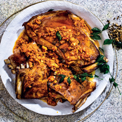 Whole roast lamb ribs with romesco sauce