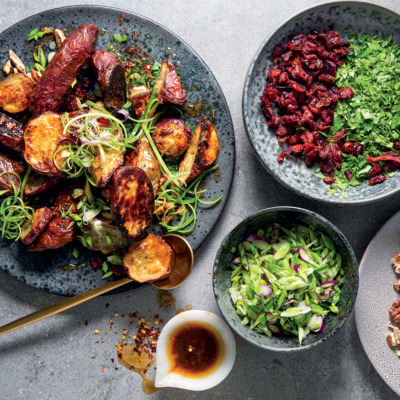 Roast sweet potato with maple syrup, pecans and dried cranberries