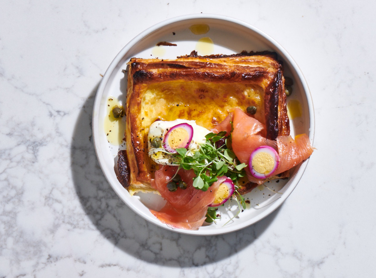 smoked salmon blini tart with beetroot stained quail's eggs
