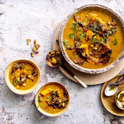 Spicy squash soup with carrot-top pesto