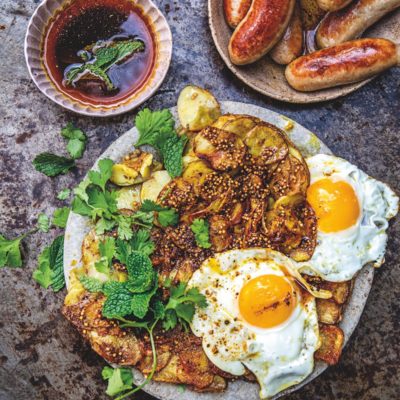 Breakfast potato cakes with crispy fried eggs