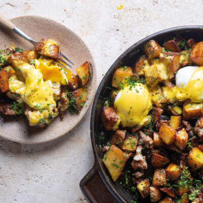 Sausage potato hash with poached eggs