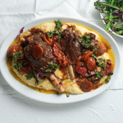 Easy venison shanks, creamy polenta and charred Tenderstem broccoli