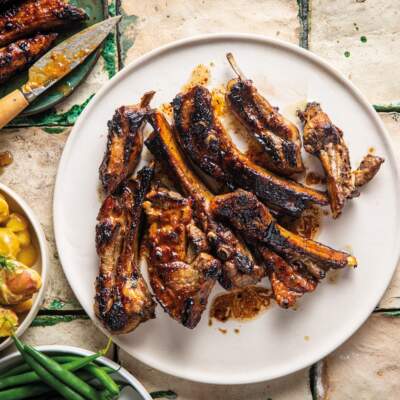 Lamb ribbetjies with coconut, chilli and lime and smoky mustard potato salad