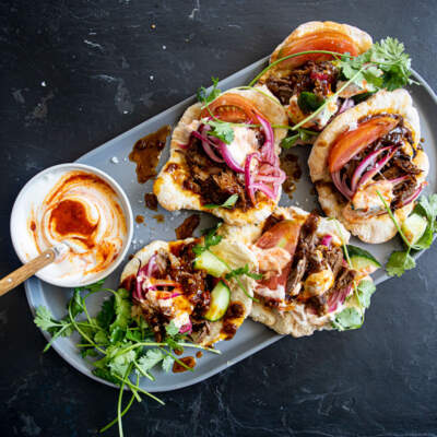 Apricot-and-rose harissa slow-cooked lamb gyros