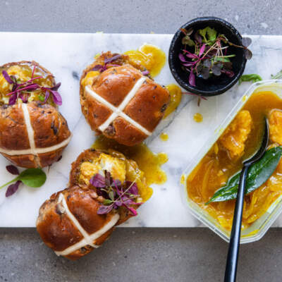 Hot cross buns with pickled fish 