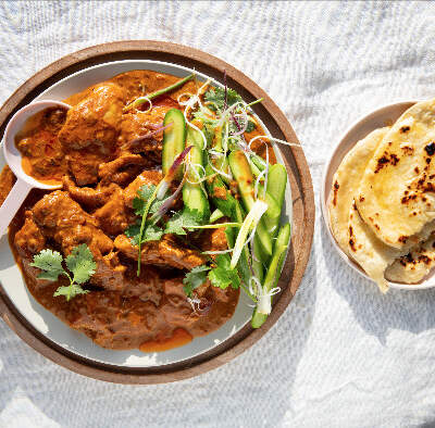 Butter chicken with garlic-butter flatbreads