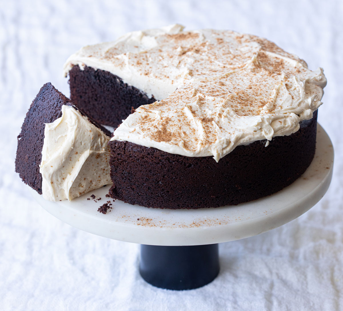 Chocolate lager cake with hot cross bun cream cheese icing