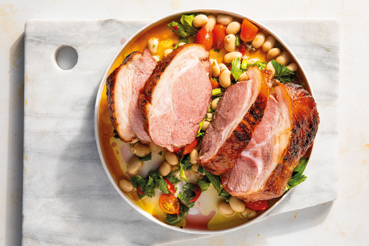 Pork shoulder with butter bean salad