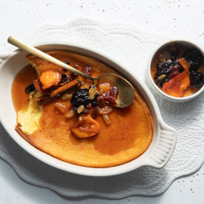 Potato pudding with stewed fruit